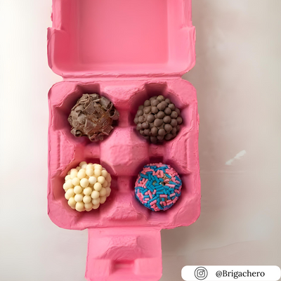 4-egg pink pulp egg carton filled with desserts
