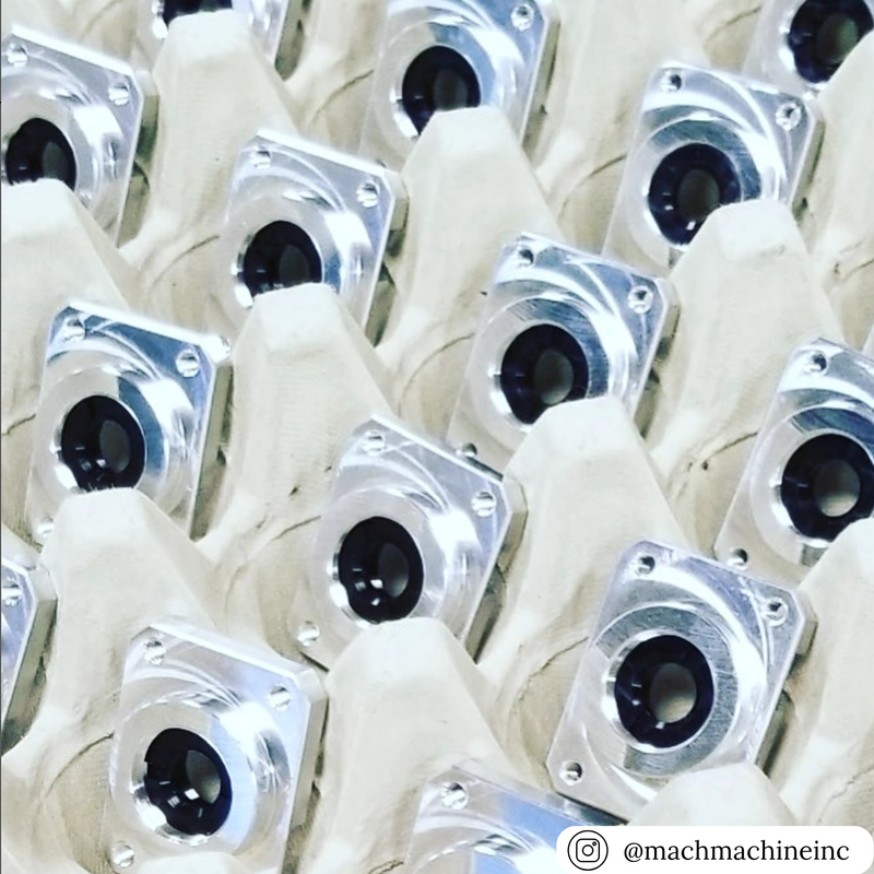 Close-up of mechanical components in a sturdy 30-cell filler flat tray